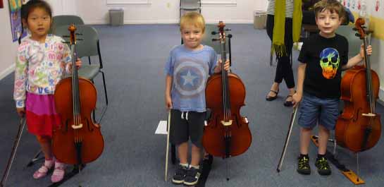 Young kids in cello class