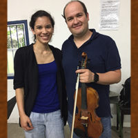 Claire with donated violin in Costa Rica
