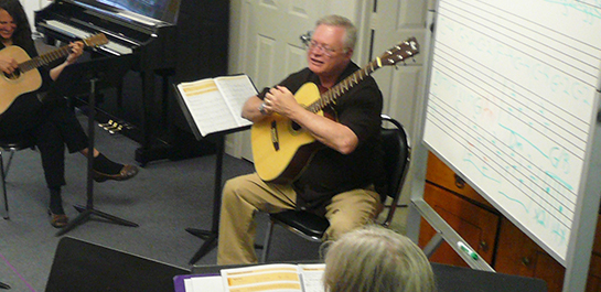 Glen McCarthy teaching guitar class