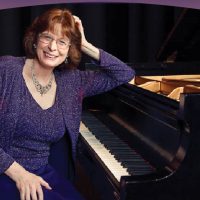 Linda Monson with grand piano