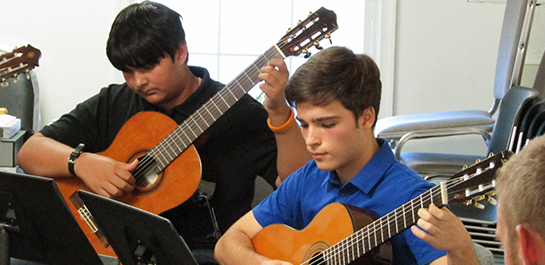 Guitar students performing at summer workshop
