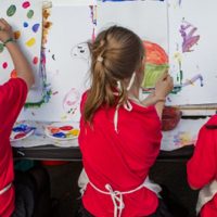 Kids painting at arts festival