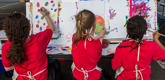 Kids painting at arts festival