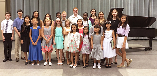Group photo of piano summer camp students