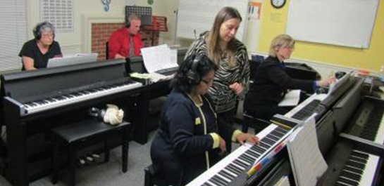 Older adults in piano class
