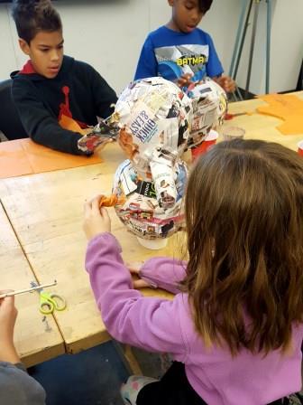 Kids creating sculptures