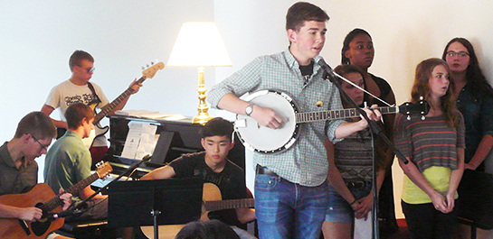 Students performing at Songwriting Workshop