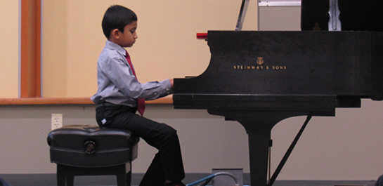 Piano student performing