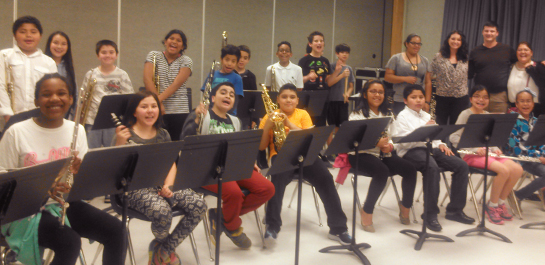 Music students at in-school service program
