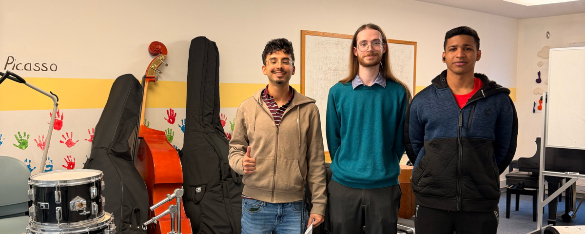 IiA staff and Culmore Center staff posing for photo