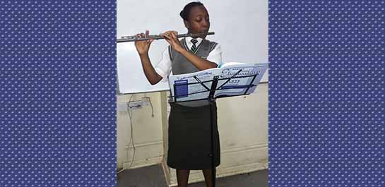 Nairobi schoolgirl with donated flute