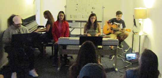 Students performing at summer songwriting camp