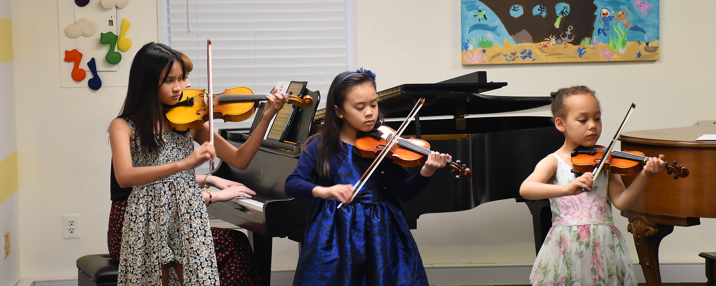 kids playing violin