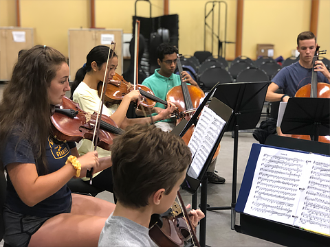 students performing in a chamber ensemble