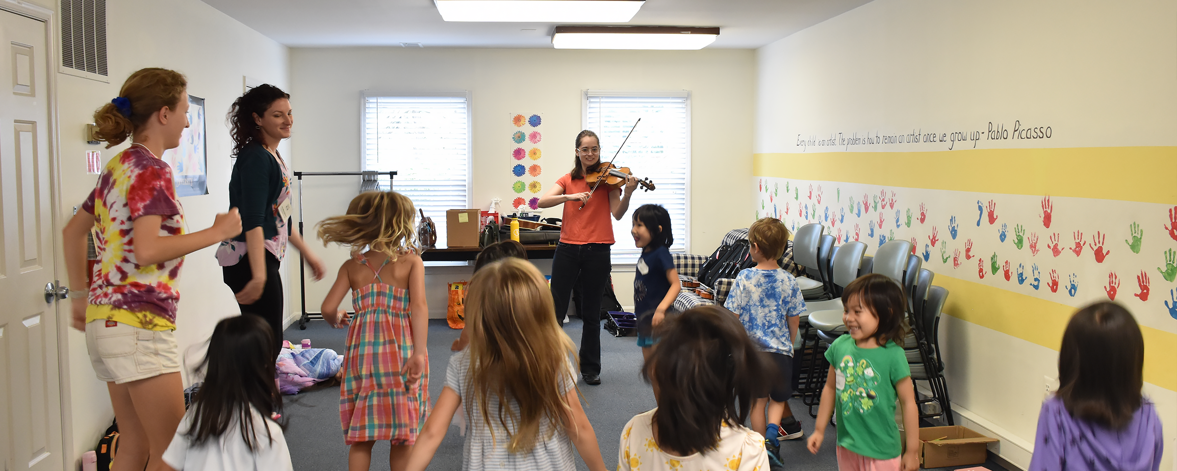 kids dancing to the violin