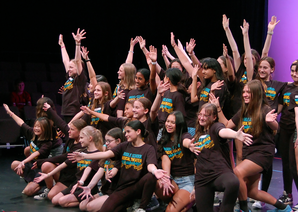 students posing for their ending song