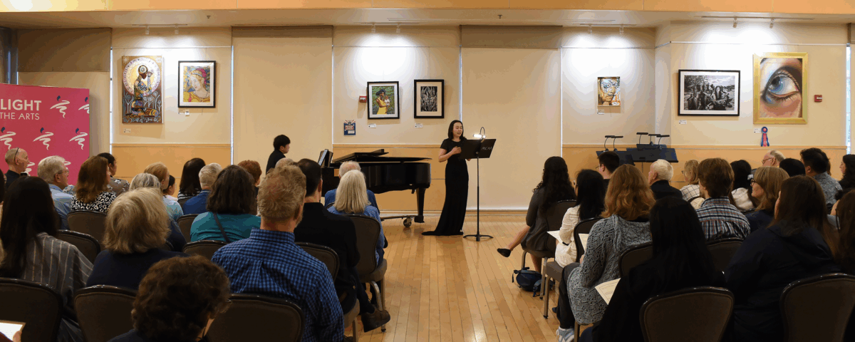 vocal teacher performing in front of an audience