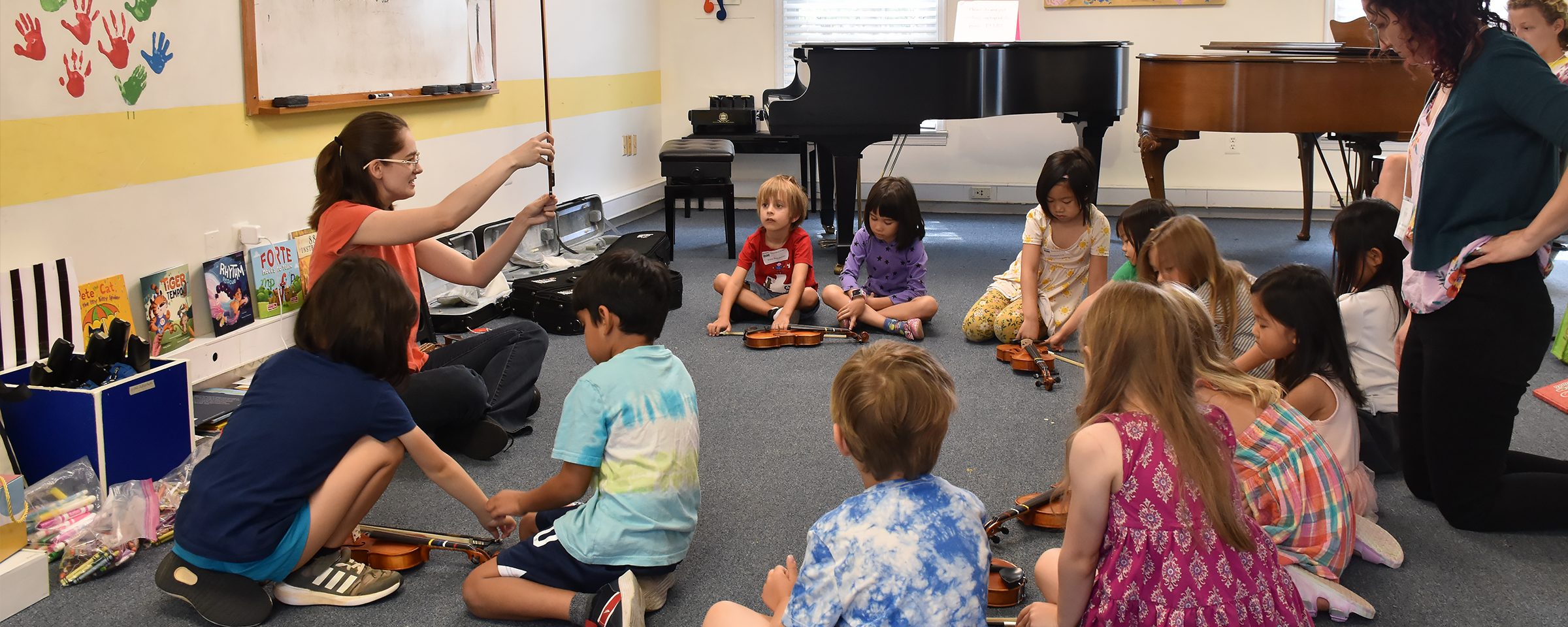 kids being introduced to the violin