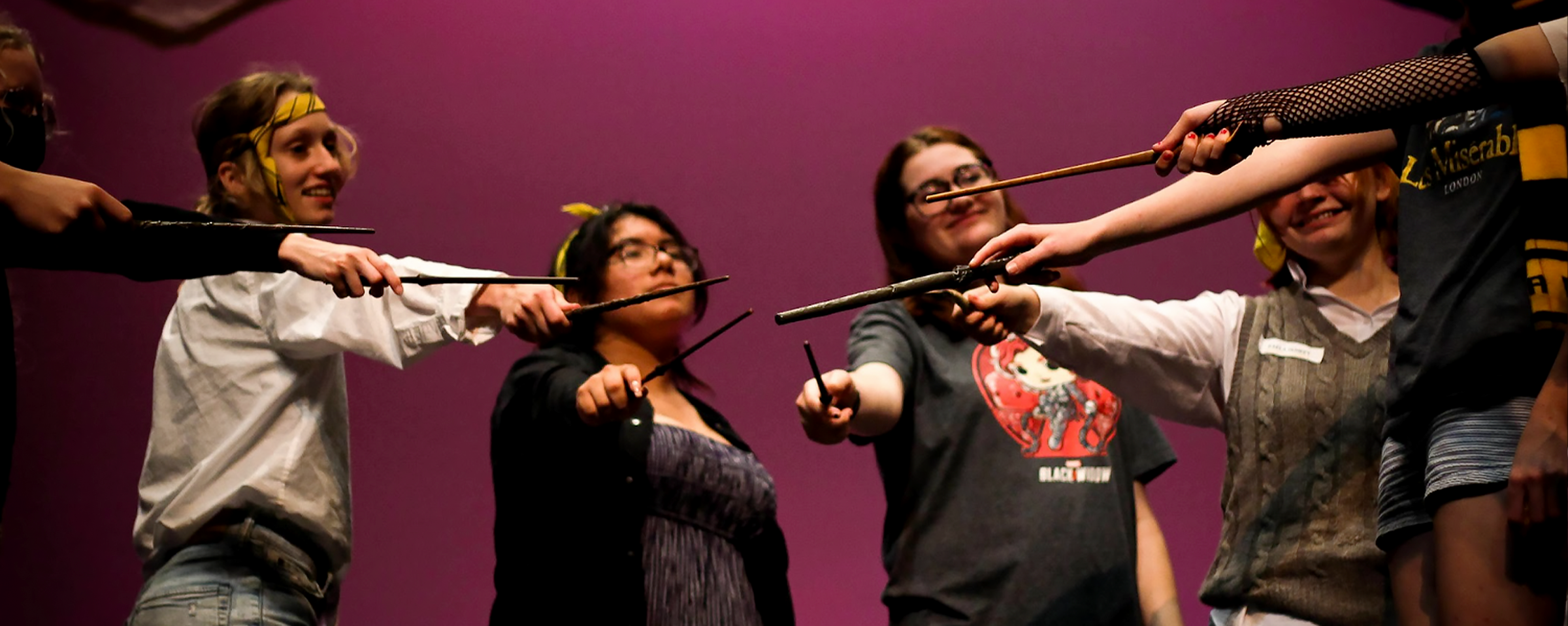 teen actors preparing for their scenes with props